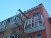 монтаж ограждающих конструкций балконов