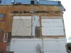 Стена после демонтажа пристроеного здания